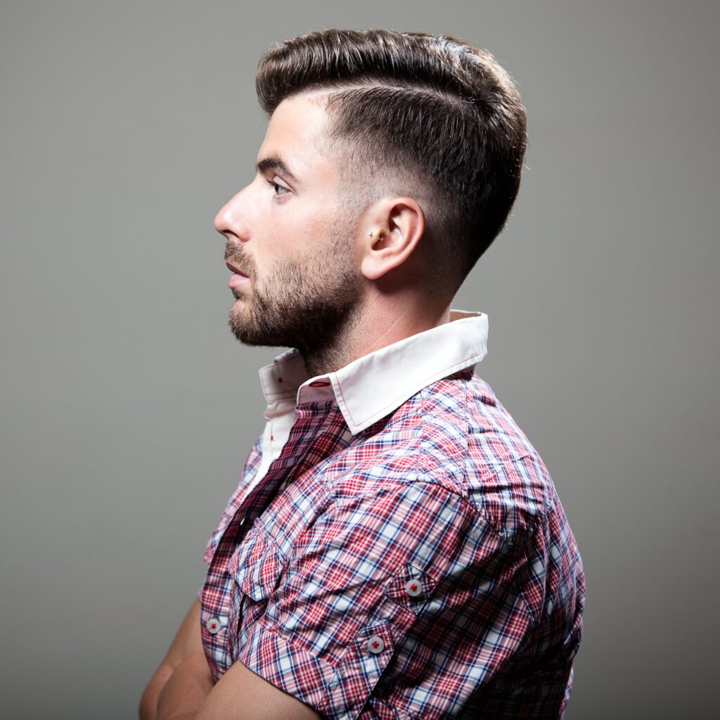 elegant-young-handsome-man-studio-fashion-portrait-min